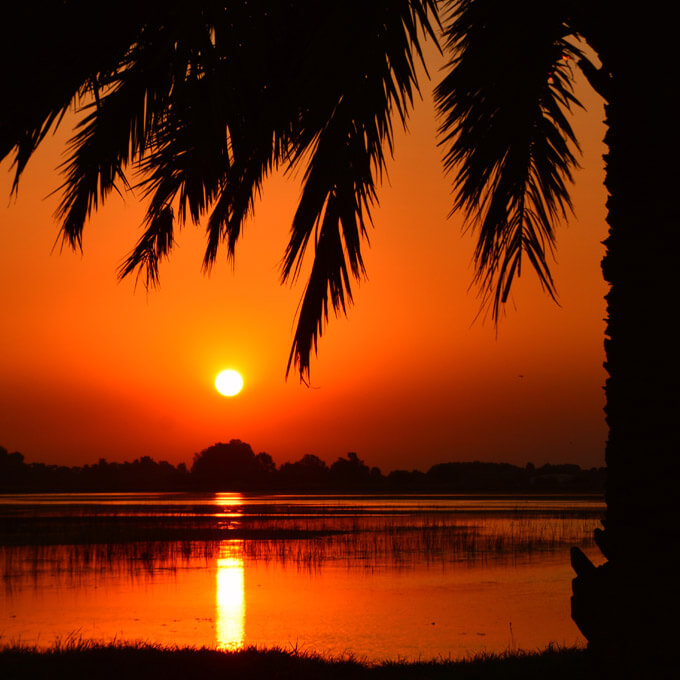 Image of Boca Raton sunset over the everglades and south florida real estate. 