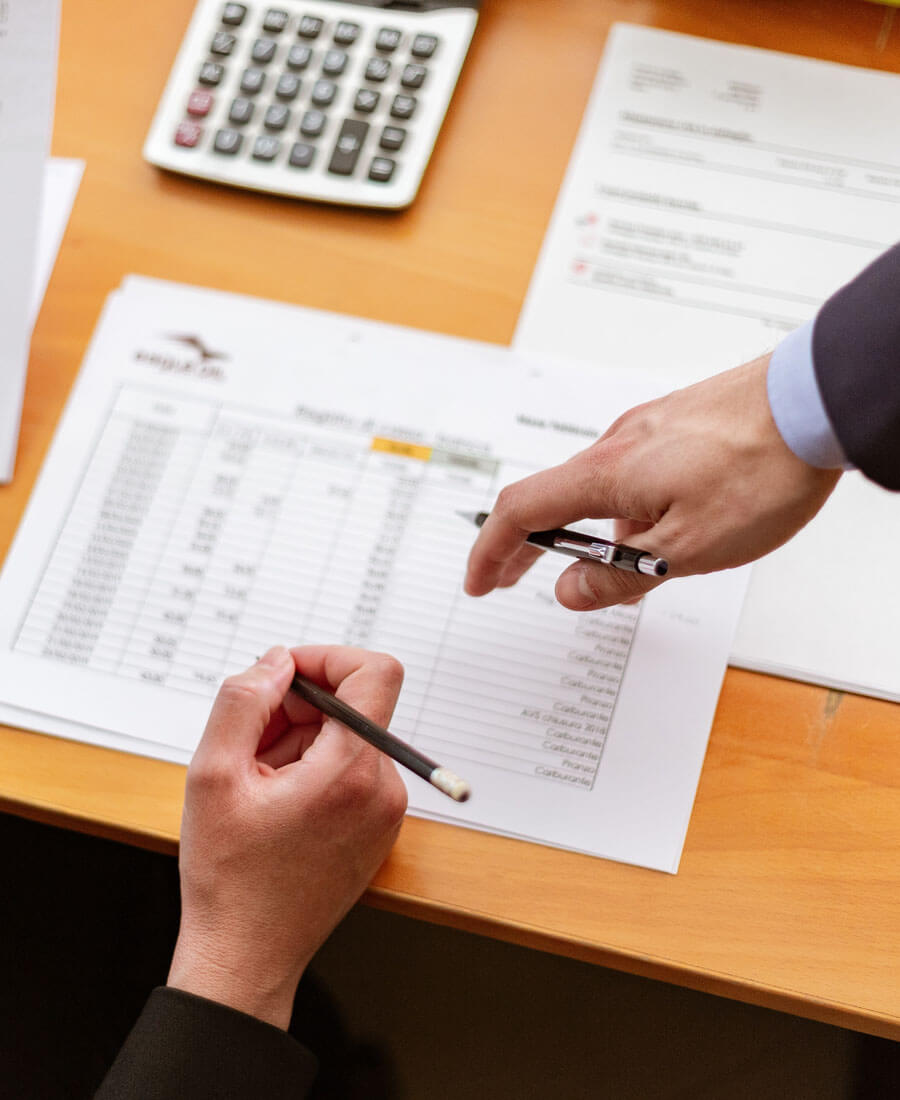 An image of people looking at title insurance transfer documents in Florida. 