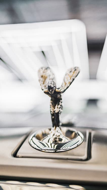 An image of a Rolls Royce emblem that illustrates the need to protect a brand with trademark application. 