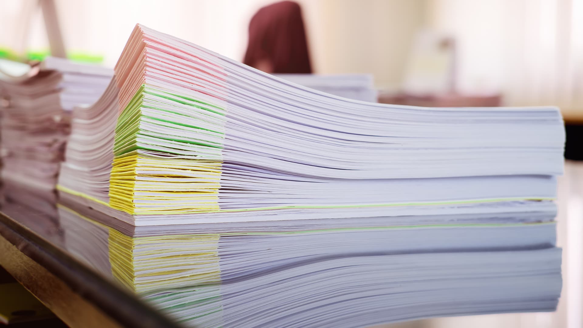 An image of Florida Annual Report documents ready for filing at a law firm.