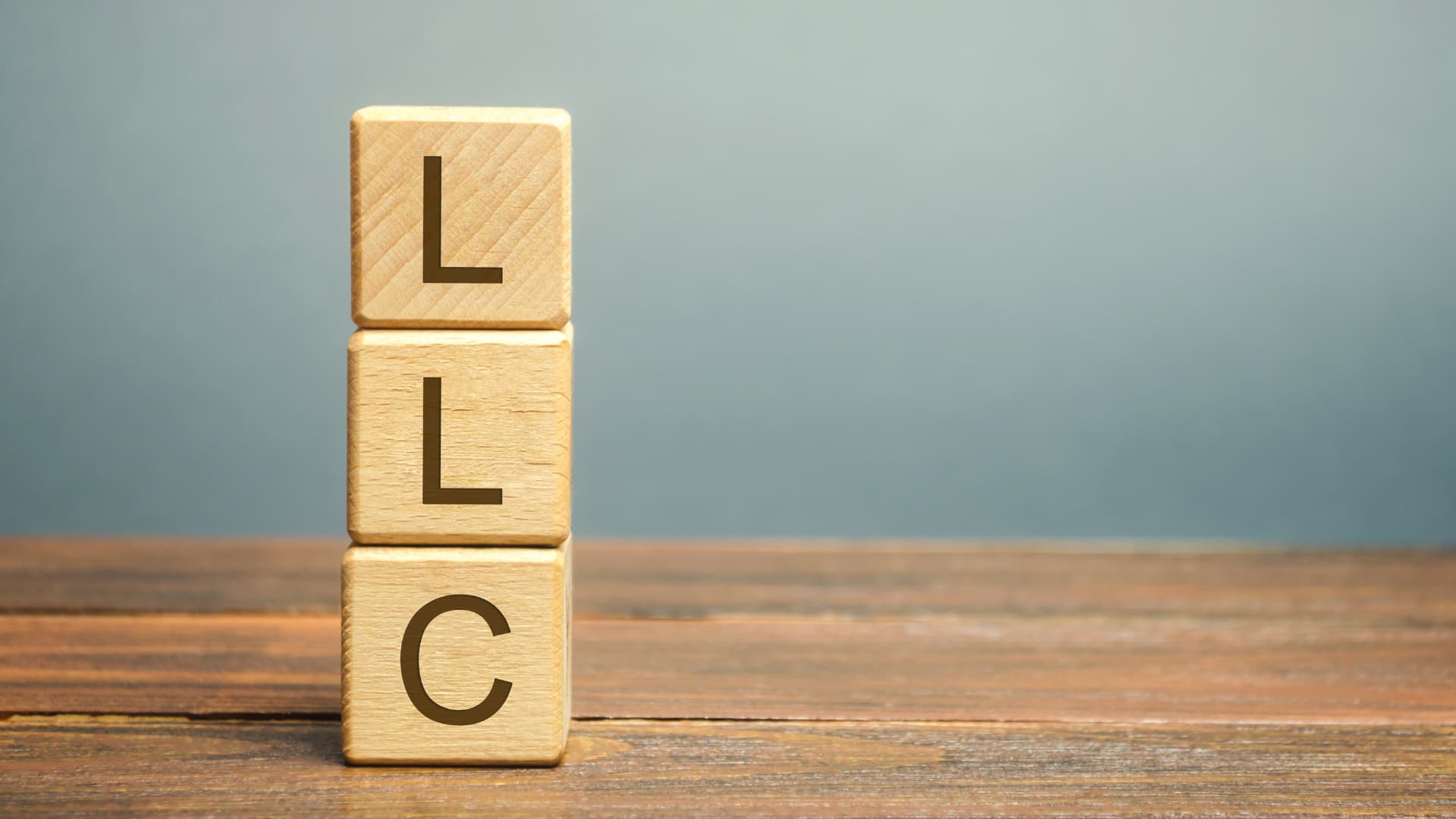 An image of blocks that spell out LLC for Limited Liability Companies