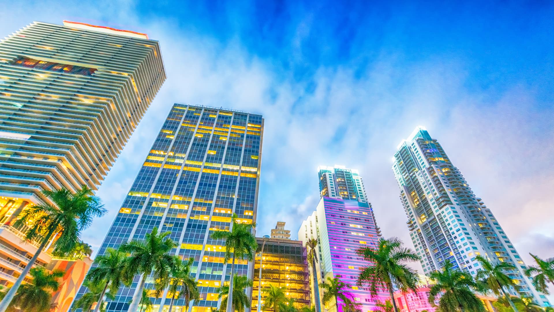 An image of downtown Miami at Sunset showing office buildings