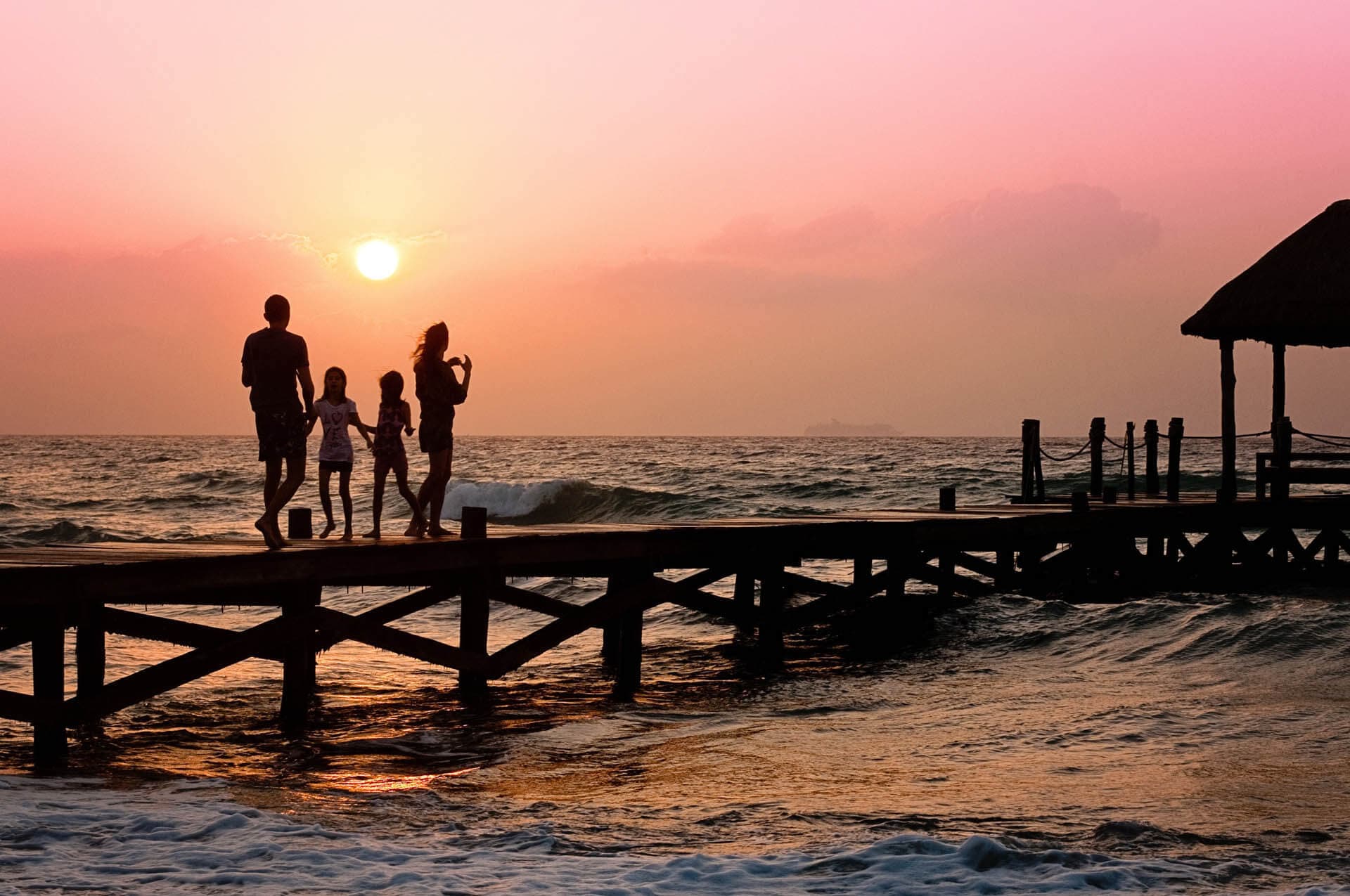An image of a family on a dock that illustrates Florida Estate Planning Solutions from ASR Law Firm