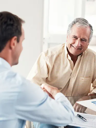 An image of an older gentleman during a revocable living trust consultation with a Florida Attorney. 