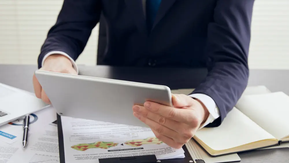 An image of an attorney managing a case file. 