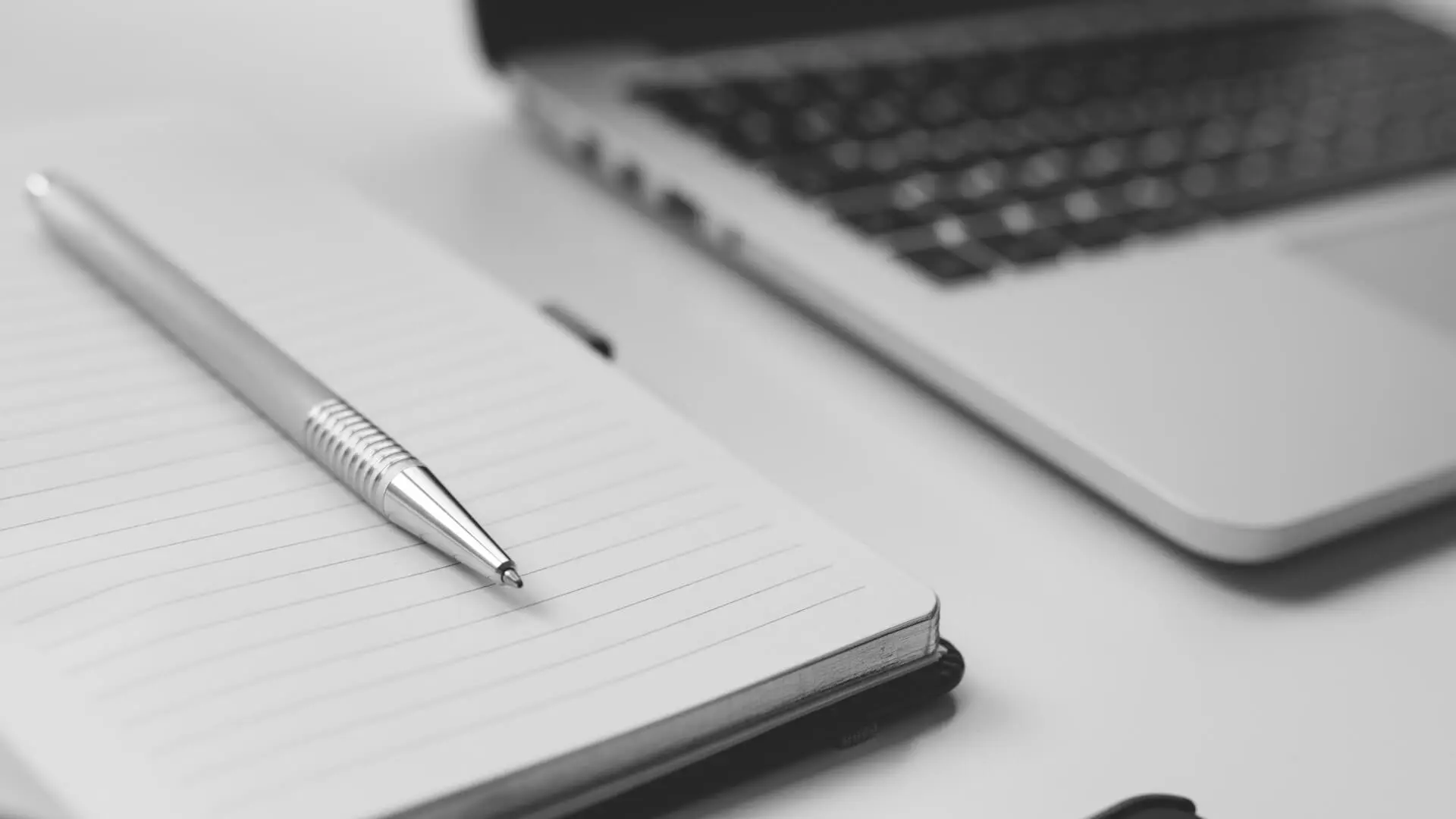 AN attorney desk with documents being drafted and strategy created. 