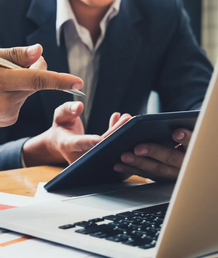 An image of an attorney going over a consultation with a client virtually. 