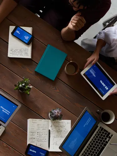 An image of an office setting from above with people working illustrating entity formation solutions in florida. 