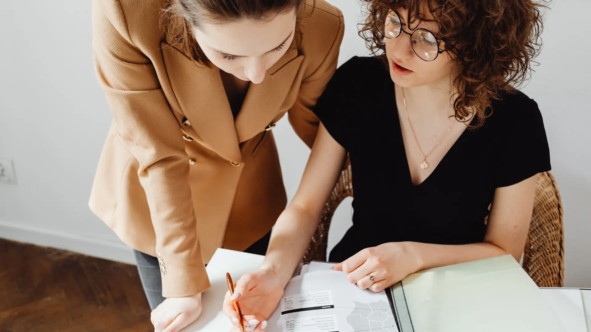 An image of family members discussing deeds transfers after discussion with real estate attorneys at ASR Law Firm.