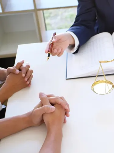 An image of a Florida Probate Attorney Meeting with Clients. 