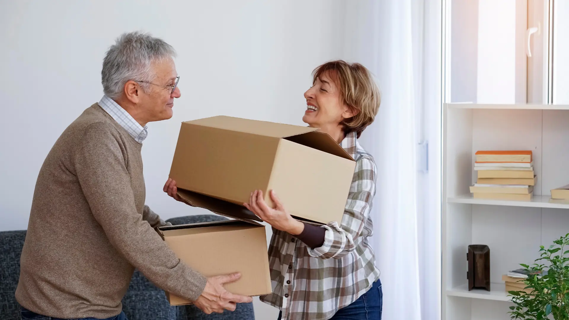 An image of seniors downsizing with new real estate helped by Florida Real Estate Attorneys at ASR law Firm