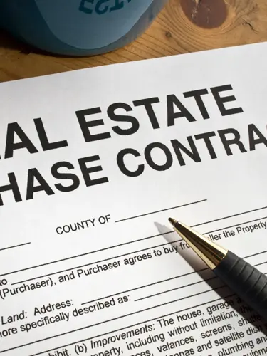 An image of a real estate purchase contract in the state of florida like those reviewed by ASR Law Firm.