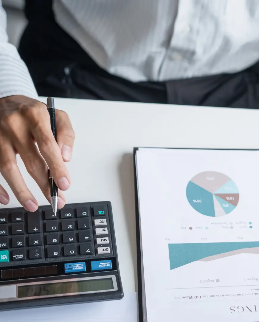 An image of an attorney calculating costs for a real estate closing in Florida