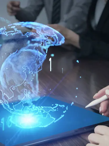 An image of a person signing on a laptop, showing the digital virtual legal services at ASR Law Firm. 