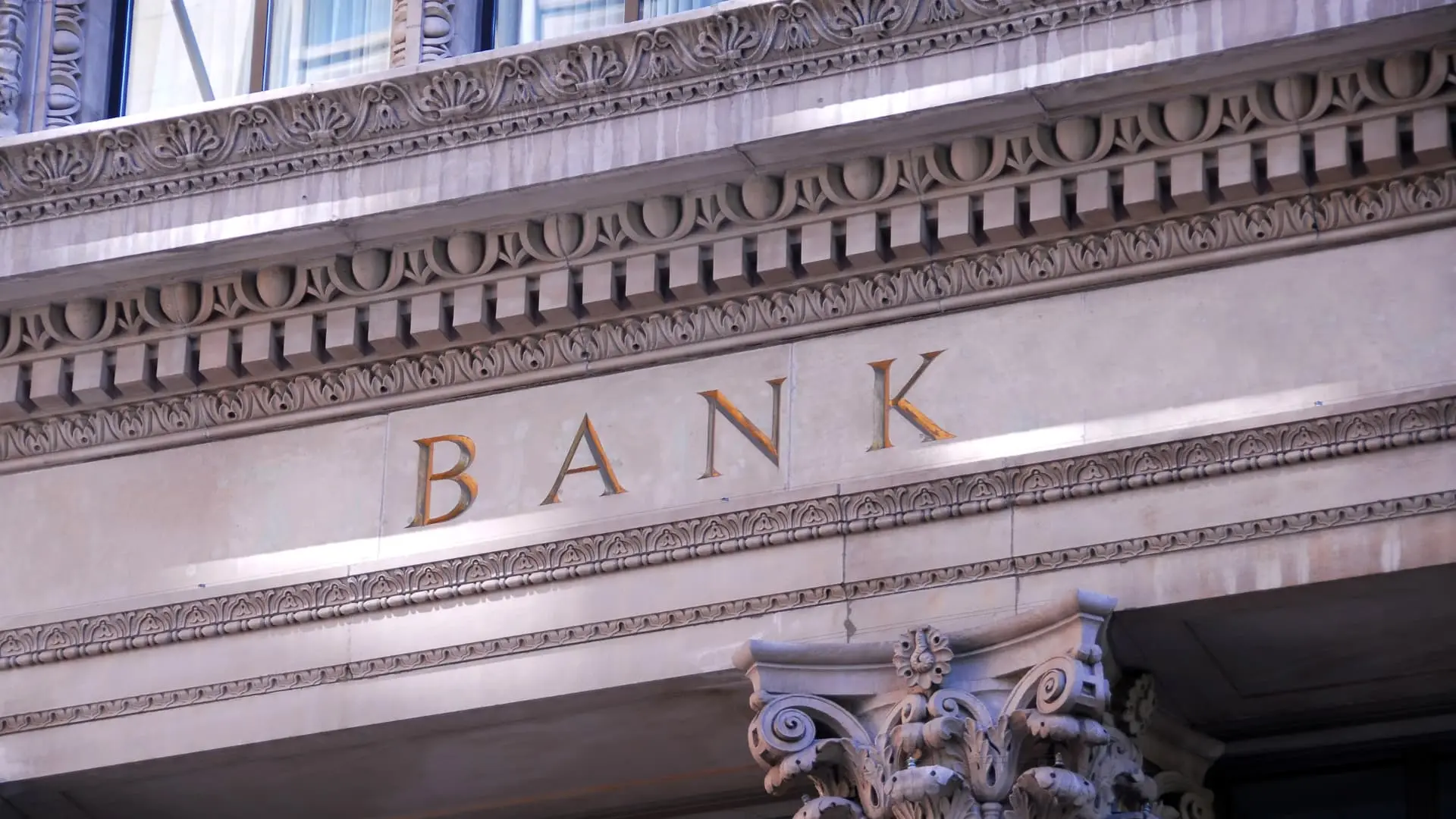 An image of a front of a bank illustrating how you can fund a revocable living trust in florida. 