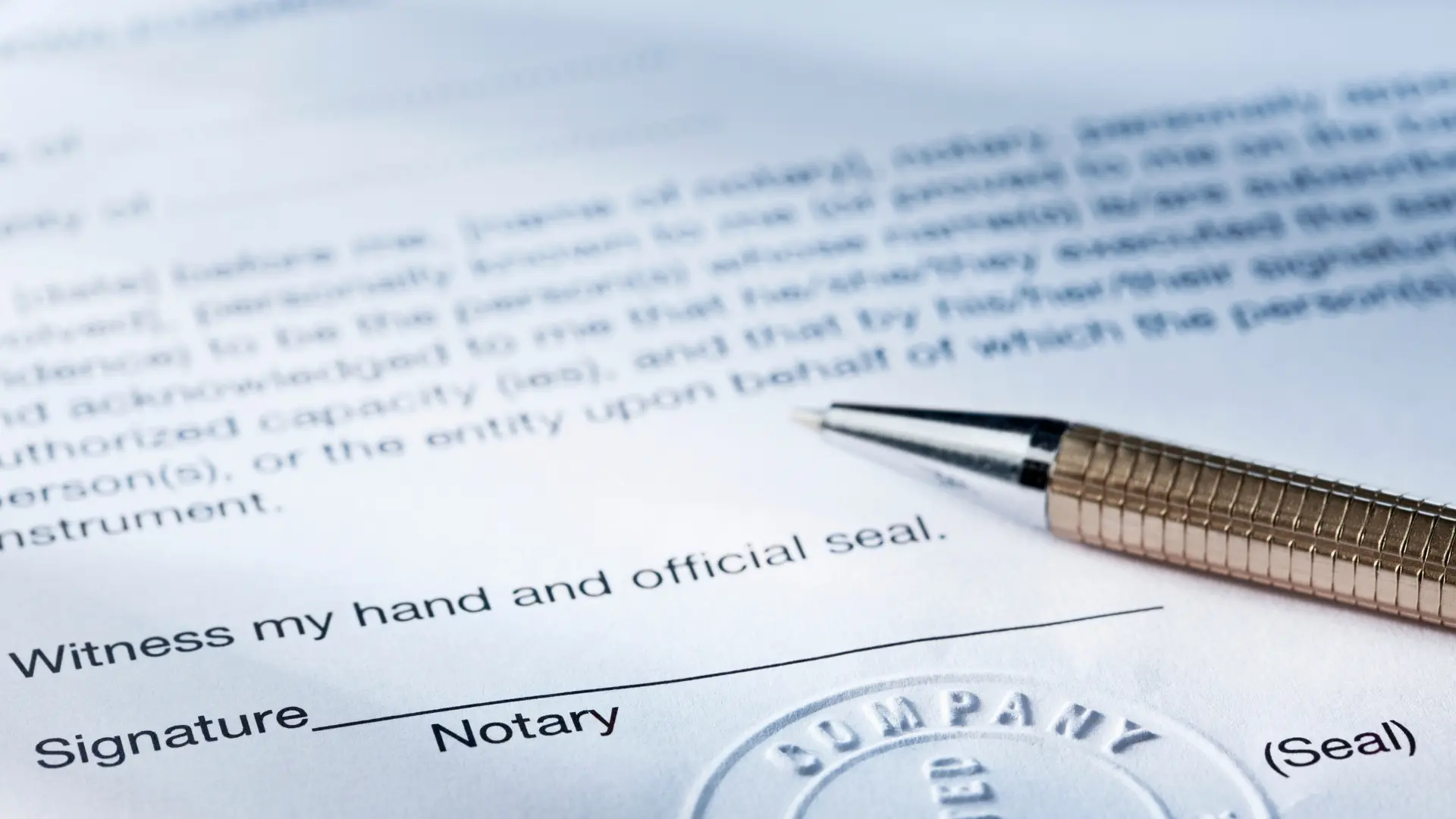 An image of a pen next to a notarized signature on a document showing why it is critical to properly execute document sin Florida. 
