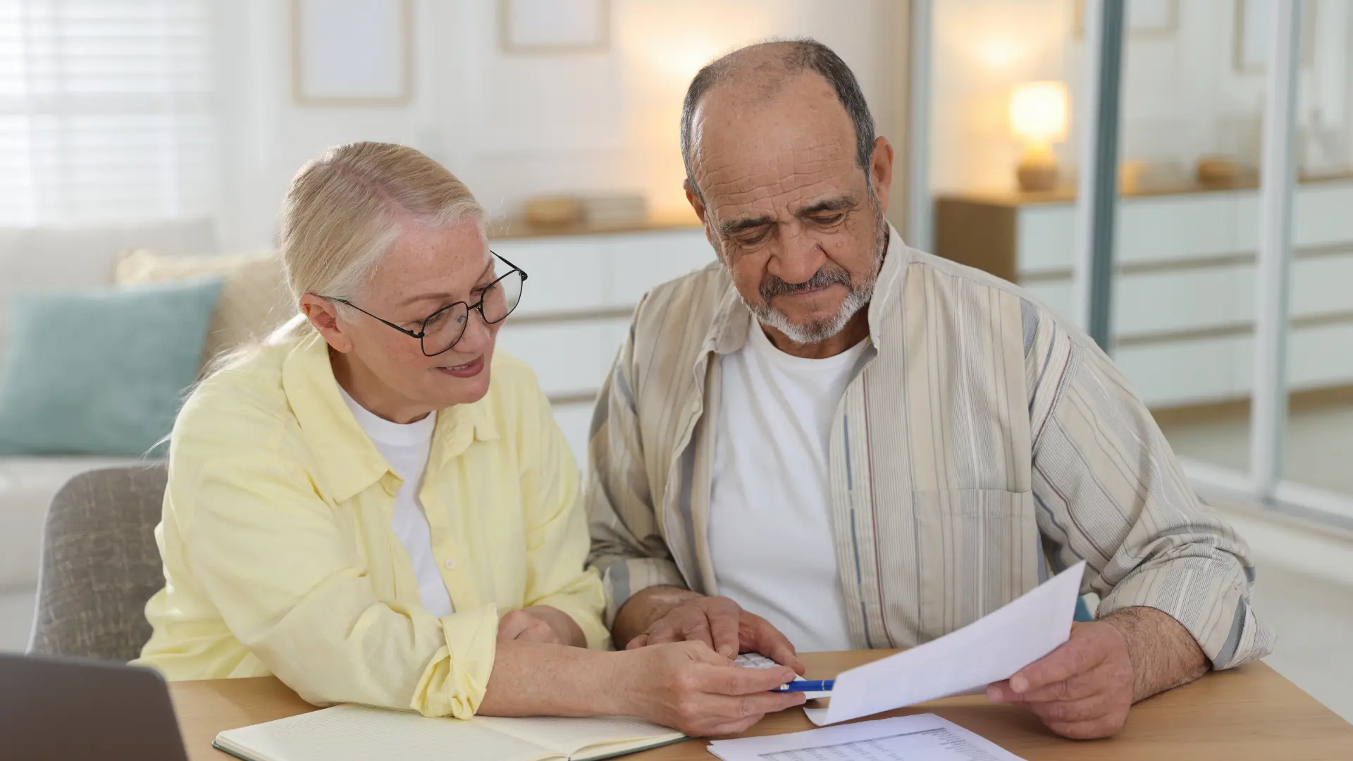 Florida couple reviewing estate planning documents at home